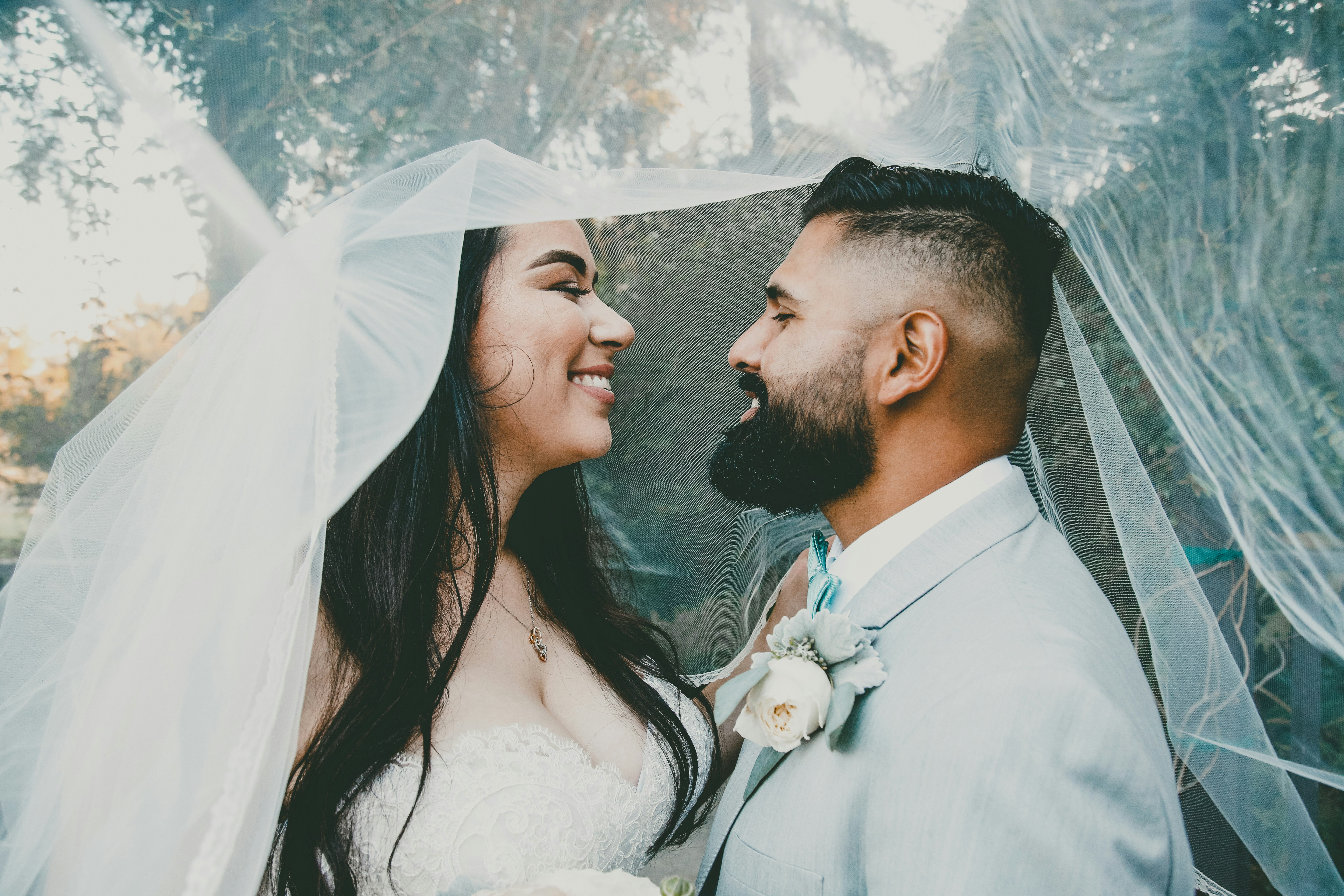 man and woman in wedding during daytime